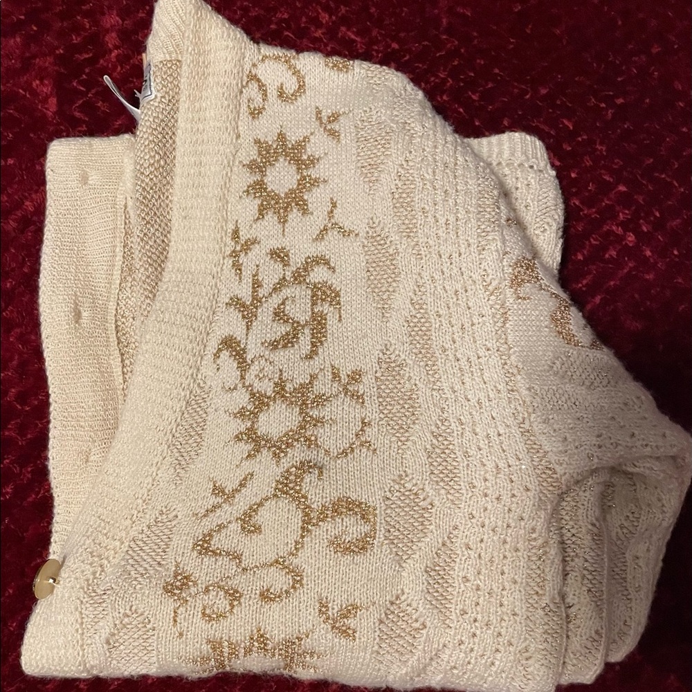 Long sweater with gold buttons